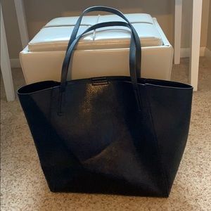 Deep, black vegan leather tote